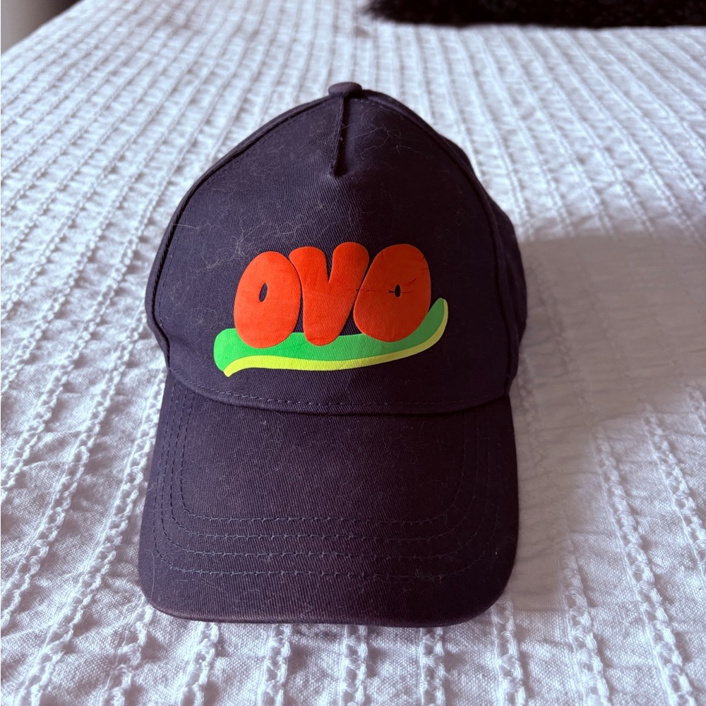 OVO hat with Orange and Green Logo